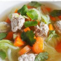 7. Garden Soup · Choice of meat in Clear broth soup with mixed vegetable topped with toasted minced garlic. (...