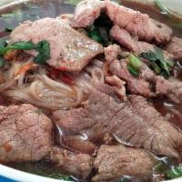 39. Beef Noodle Soup · Rice noodle with stewed beef with herbs, bean sprouts, and onions. (Rice not included)