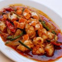 11. Num Prik Pao · Sauteed choice of meat with red, white, and green onions, bell peppers, carrots, and basil. ...