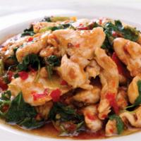 13. Pad Basil · Sauteed choice of meat with fresh basil, onion, bell pepper, mushrooms, baby corn and chili ...