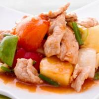 23. Sweet and Sour · Sauteed choice of meat, cucumber, tomatoes, carrots, onions, pineapples, and bell peppers wi...