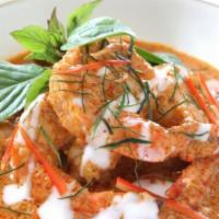 36. Panang Curry · Choice of protein in panang curry sauce with coconut milk, bell peppers and fresh basil. Spi...