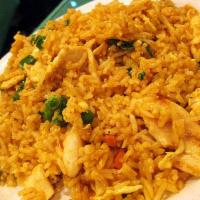 52. Curry Fried Rice · Fried rice with curry powder, carrots, celery, egg and onions.