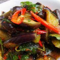 61. Eggplant Lover · Stir-fried eggplant, zucchini, carrots, bell peppers, and basil.