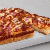 BBQ Chicken Pizza · BBQ sauce, premium mozzarella, grilled chicken, bacon and red onions.