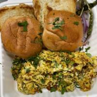 Burji Pav · Egg Bhurji is India's take on scrambled eggs, masala – which is stir-fried ginger, garlic, g...