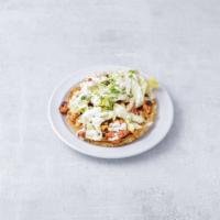 Sopes · Grilled Mexican corn dough patties topped with choice of meat, lettuce, queso fresco and sou...