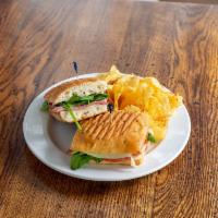The Grinder Sandwich · Includes ham, pepperoni, salami, mozzarella, provolone, creamy Italian dressing, onion, shre...