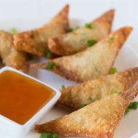 Crab Rangoon · Cream cheese and crabby fried delights.