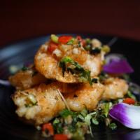 Mandarin Prawn · Breaded prawns sauteed with onions, bell peppers and cilantro in chef's ginger garlic sauce.
