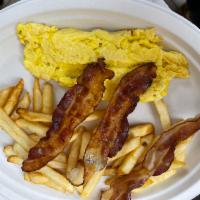 2 Eggs, Any Style with Bacon  · With bacon, pork delicious bacon, bacon… oh yeah with home fries and buttered toast