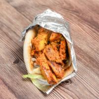 Chicken Gyro · Cooked on a spit and wrapped in a pita. 