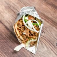 Lamb Gyro · Cooked on a spit and wrapped in a pita. 