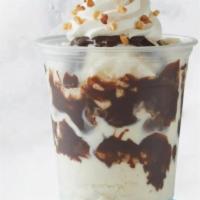 Classic Sundae · Two Scoops of Vanilla ice cream layered with Fudge and topped with Whipped Cream, Sundae Nut...
