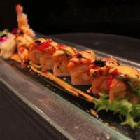 Crazy Friday Roll · Shrimp tempura and spicy crab-meat inside roll eel with soy bean sheet, topped with spicy sa...