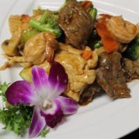 Triple Delight · Chicken, beef, shrimp with mix vegetable with chef's special sauce. 