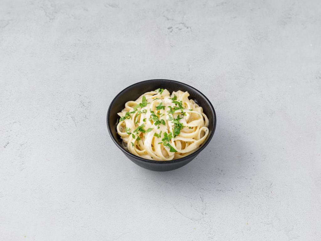 Fettucini Alfredo · Cheese and butter based cream sauce.  Served over your choice of any pasta. 