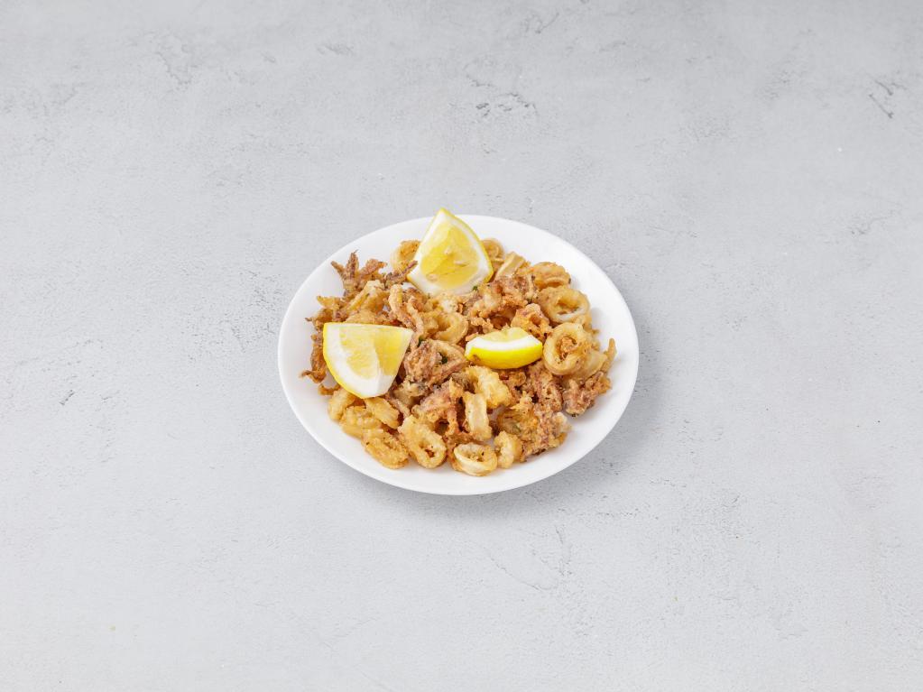 Fried Calamari · Fried Calamari over your choice of pasta with marinara sauce.