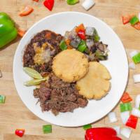 Chopped Brisket Arepa Plate · House smoked beef brisket, two arepas, black bean chili topped with cheese, grilled peppers ...