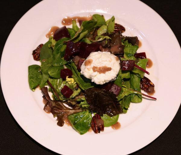 Warm Goat Cheese and Roasted Beet Salad · On mesclun greens with candied pecans and raspberry vinaigrette.
