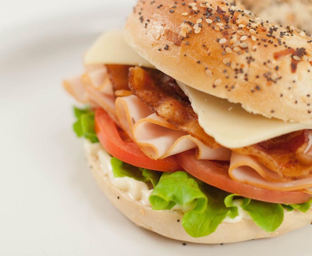 The Bagel Club Sandwich · A loaded bagel club sandwich served on your favorite bagel from Brooklyn Bagel Bakery.