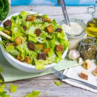 Caesar Salad with Chicken · Romaine heart lettuce with seasoned croutons and chicken breast