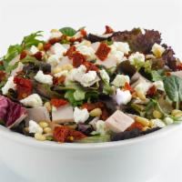 Sun Dried Melody · Baby mixed greens, pine nuts, sun dried tomatoes, turkey and feta cheese served with a mango...