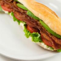 A-BLT · Bacon, bacon, bacon, avocado, lettuce, tomatoes and mayo on a french baguette. Baconlicious.