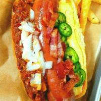 Spiced Chili Cheese Dogz · Premium Wagyu beef dog topped with chili, spicy queso, bacon, onions, jalapeño peppers.
