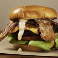 Remy’s Bacon Cheeseburger · Premium 8 oz short rib burger with American cheese, bacon, caramelized onions lettuce and to...