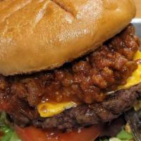 Cutter’s Chili Burger · Premium short rib burger topped with onion rings, Cheddar cheese, homemade chili,  served wi...