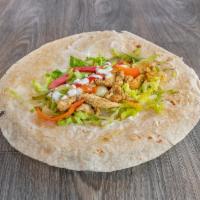 Shawarma Wrap Lunch · Chicken or lamb, lettuce, tomato, pickles with yogurt sauce.