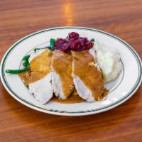 Thanksgiving Dinner · Mashed potatoes, string beans, cornbread stuffing, cranberry relish.