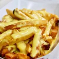 Cheeze Fries (GF) · Crispy fries topped with creamy cheeze sauce.