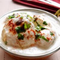 Dahi Wada · Blend of lentil dumplings immersed in yogurt blended with sweet and spicy sauce garnished wi...