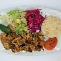 Chicken Gyro · Thinly sliced chicken gyro served with rice, house salad and red cabbage