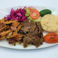 Mixed Gyro · Thinly sliced lamb & chicken gyro served with rice, lettuce and sliced tomatoes