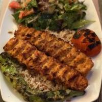 Chicken Adana Kebab · Char-grilled ground chicken seasoned with mixed
spices served with rice
