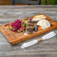 Kofte Kebab · Char-grilled ground lamb & beef meatballs seasoned with Mediterranean spices