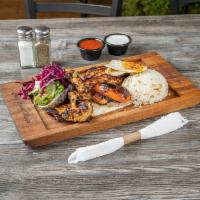 Chicken Chops · Char grilled marinated chicken thighs served with house salad and rice