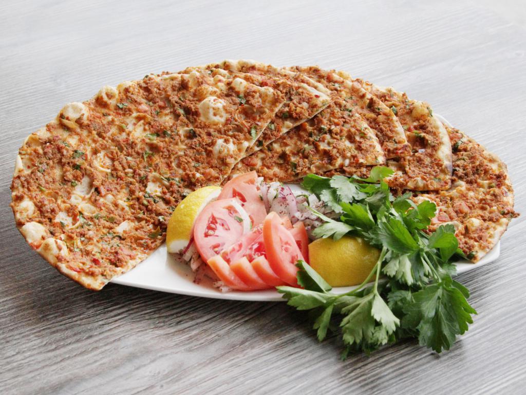 Lahmajoun · Homemade thin, crispy flat dough topped with ground lamb, special spices