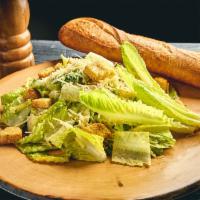Caesar Salad · Chopped romaine, shredded Parmesan cheese, roasted garlic & herb croutons, creamy caesar dre...