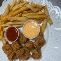 Shrimp and Chips · Perfectly seasoned and fried served with our hand cut french fries and our signature house t...