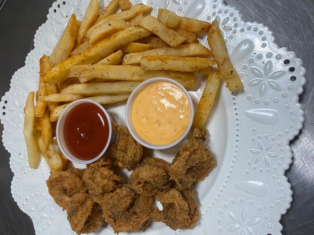 Shrimp and Chips · Perfectly seasoned and fried served with our hand cut french fries and our signature house tartar sauce.