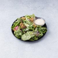 Caesar Salad · Romaine lettuce, Parmesan cheese, croutons, creamy Caesar dressing.