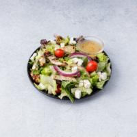 Tuscan Salad · Garden salad with grilled chicken, avocado and diced fresh mozzarella. 