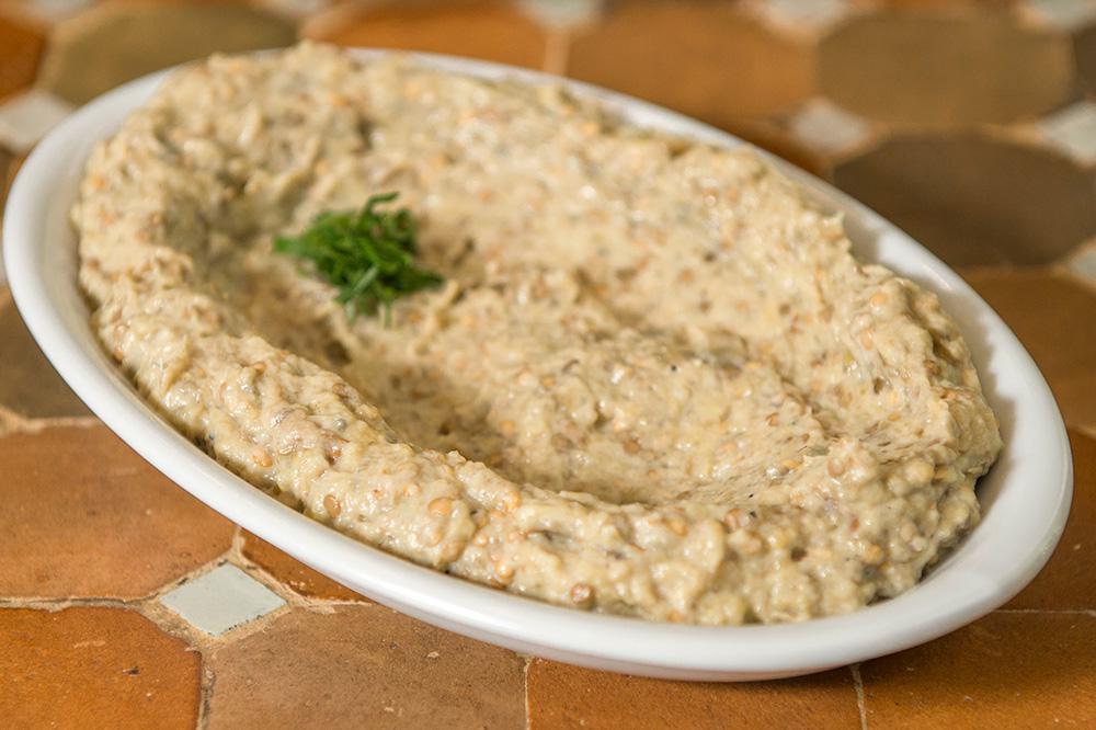 6. Babaghanoush · Smoked eggplant flavored with tahini, garlic, black pepper, lemon juice and olive oil.