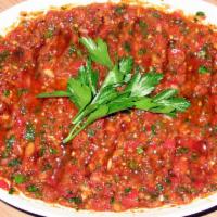 9. Ezme · A finely chopped mix of tomatoes, bell peppers, onions, garlic, parsley, walnut and red pepp...