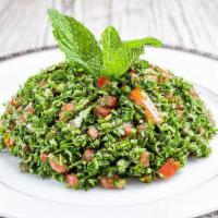 15. Tabbouleh · A fresh parsley salad with cracked wheat, scallion and tomato; seasoned with olive oil and l...