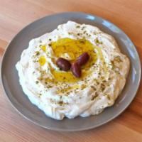 16. Labneh · Thick, creamy labneh cheese flavored with walnut, garlic and olive oil.